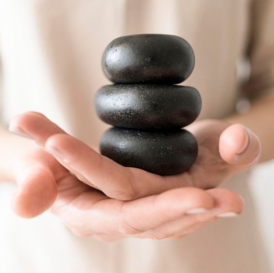 Warm stone massage